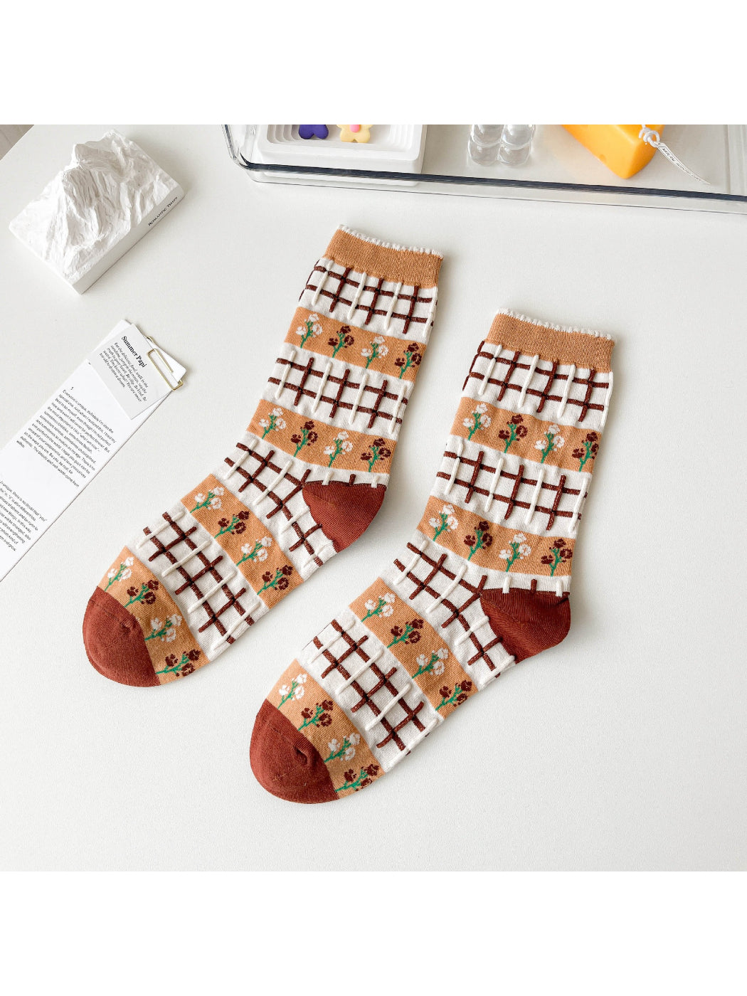 Close-up of the cuff and fabric texture of Rufia Woodland Bloom mixed crew socks