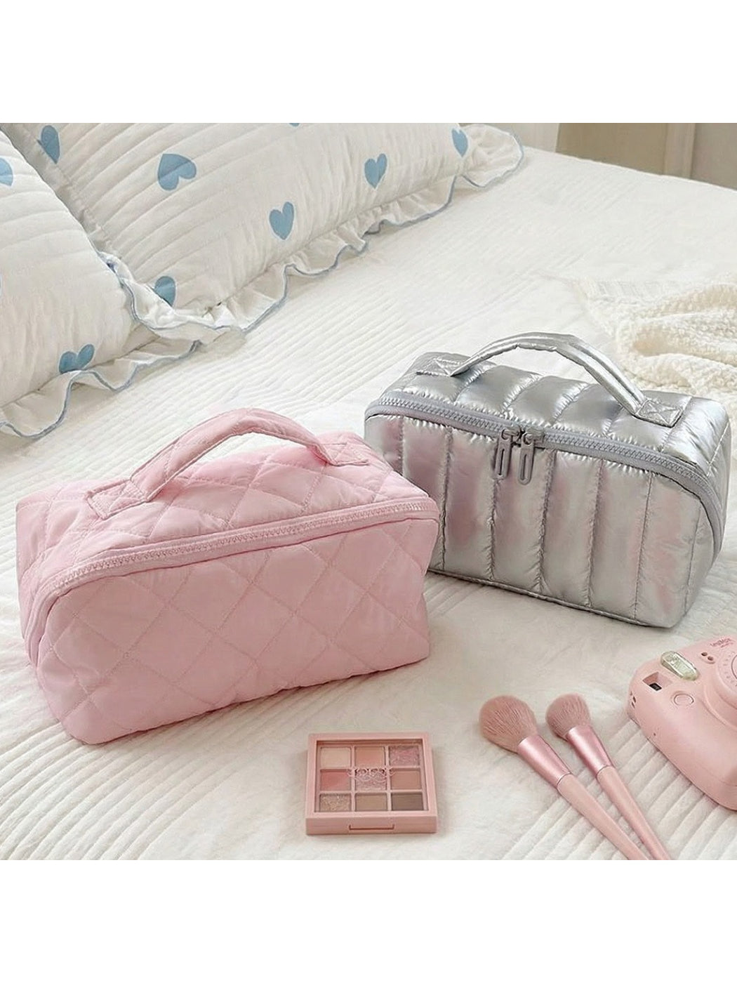 Cosbai portable makeup bag with top handle in a neutral color on a white background
