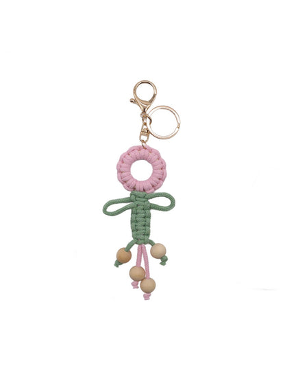 Koco Woven Flower Keychain for Bags showing floral motif and woven texture