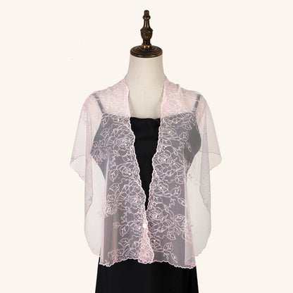 Scarvii delicate sheer floral wrap displayed flat showing light fabric and floral pattern