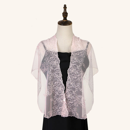 Scarvii delicate sheer floral wrap displayed flat showing light fabric and floral pattern