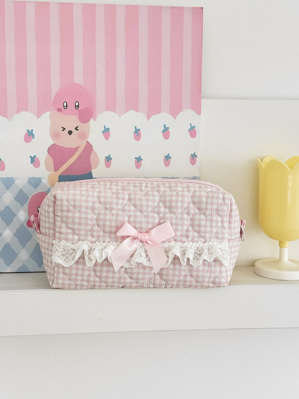 Cosbai cosmetic pouch open with makeup items inside