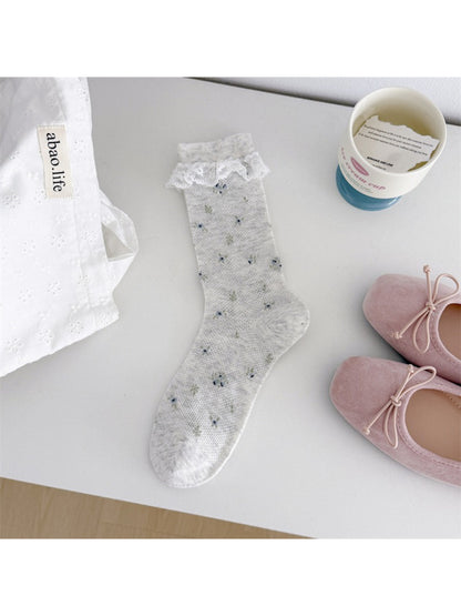 Rufia Romantic Lace Cuff Crew Socks in cream color with intricate lace cuff detail