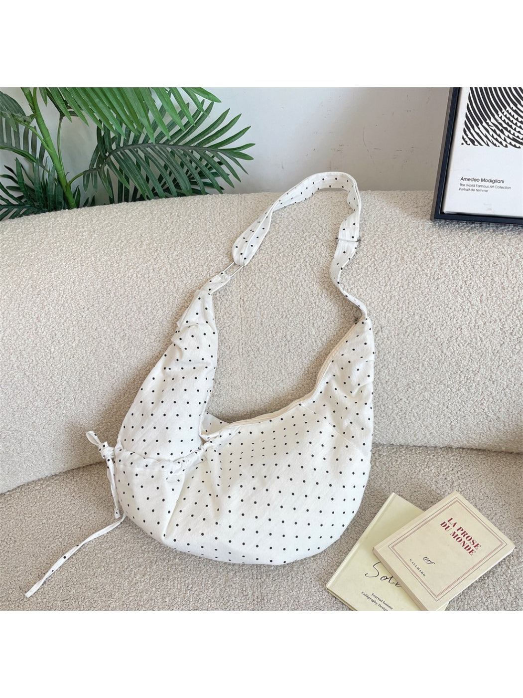 Cosbai Polka Dot Crescent Shoulder Bag worn on shoulder with strap