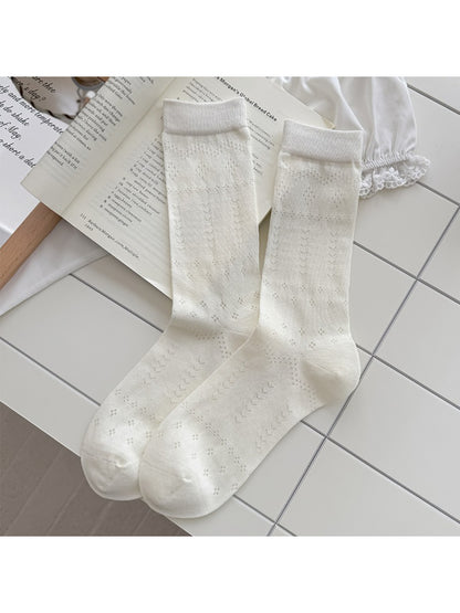 Rufia soft pointelle socks folded neatly with visible knit details