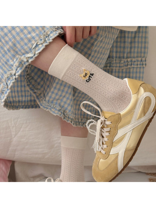 Pair of Rufia soft cat knit crew socks in pastel colors displayed flat
