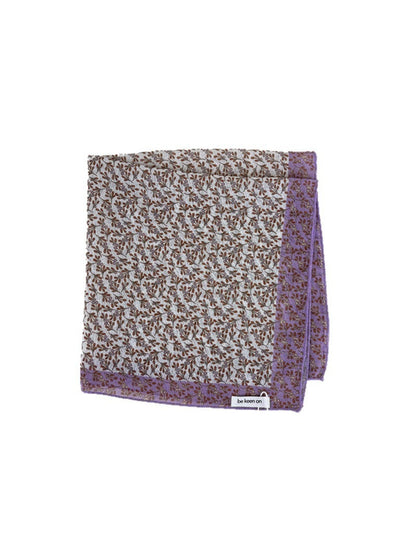 Scarvii square scarf laid flat displaying full ditsy floral border pattern