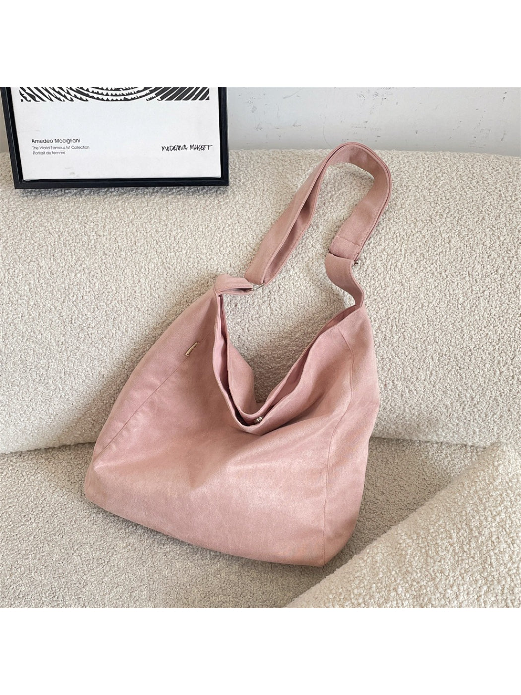 Side view of Cosbai soft slouchy minimal shoulder tote bag showing its depth and texture