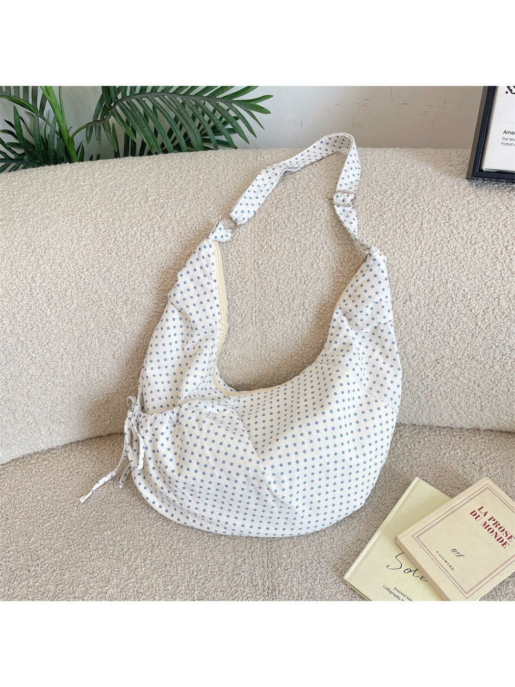 Close-up of Cosbai Polka Dot Crescent Shoulder Bag fabric texture and polka dot design
