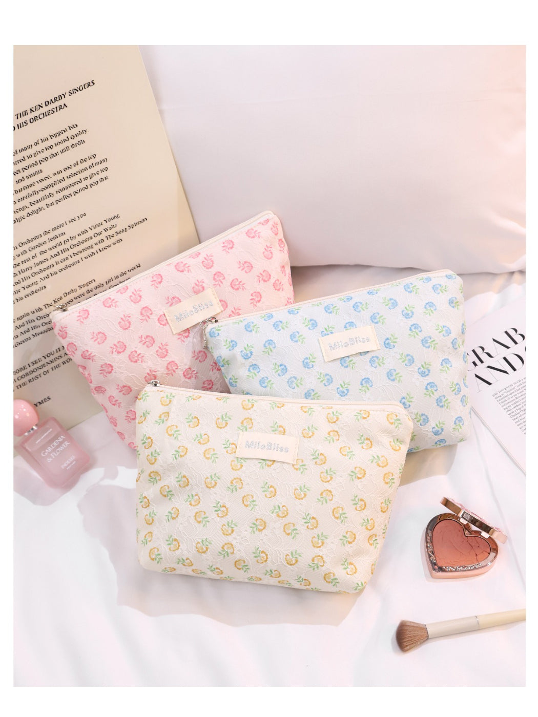 Cosbai small floral embroidered makeup pouch with zipper visible on top