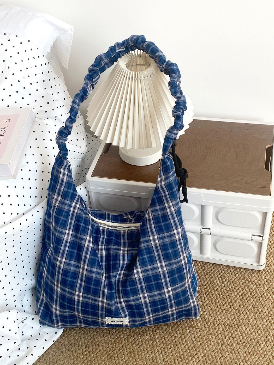 Interior view of Cosbai plaid slouchy shoulder bag showing lining and pocket
