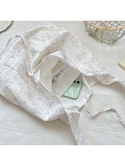 Interior view of Cosbai floral bow shoulder bag showing lining and pocket
