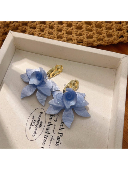 Earwish artistic floral drop earrings styled with a matching necklace