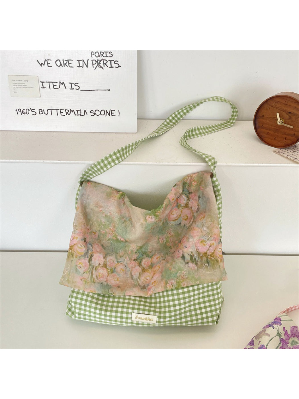 Cosbai gingham floral patchwork tote bag hanging on a hook