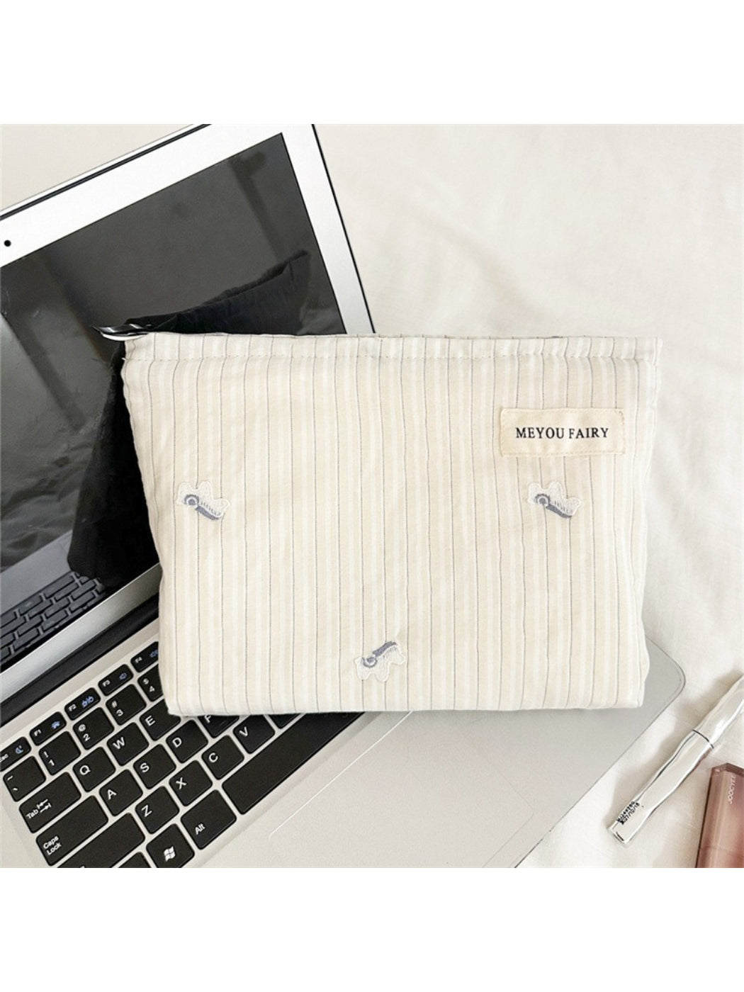 Cosbai Soft Stripe Makeup Pouch open showing interior lining