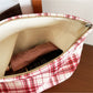 Cosbai red plaid cosmetic bag angled to show front and side details