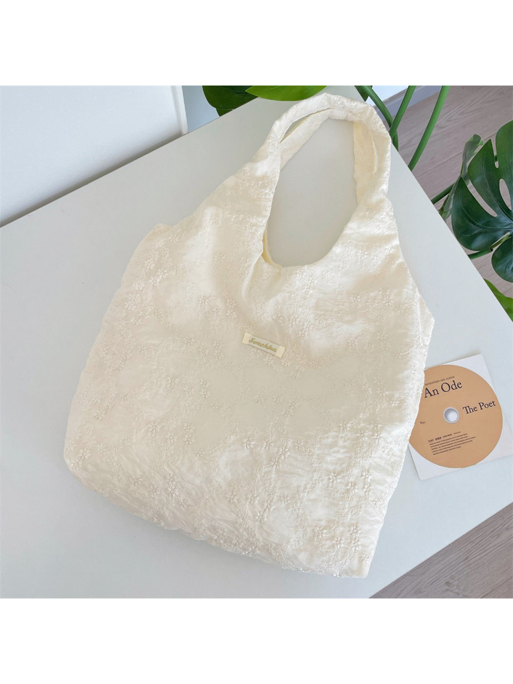 Close-up of daisy embroidery detail on Cosbai Soft Daisy Shoulder Tote Bag