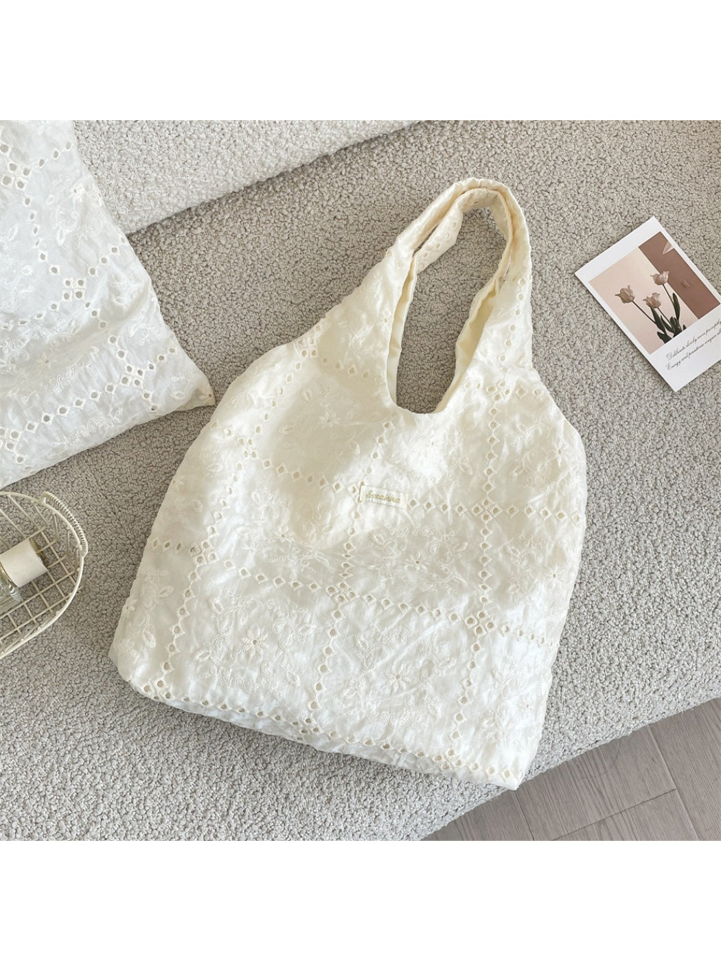 Interior view of Cosbai white floral embroidered hobo bag with spacious lining