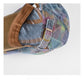 Haila washed denim plaid vintage newsboy cap displayed on a mannequin head