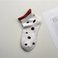Side view of Rufia Dot Color Block Low Cut Socks highlighting color block sections