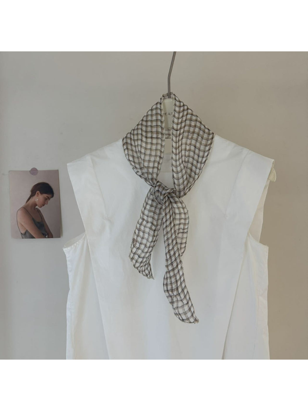 Scarvii skinny scarf rolled up highlighting fabric texture and pattern