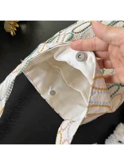 Top view of Cosbai shoulder bag highlighting and strap attachment