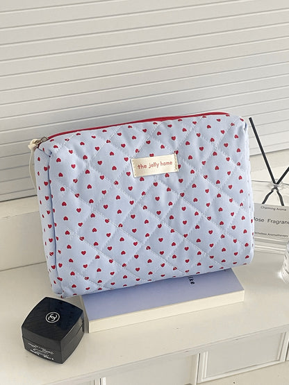 Cosbai lightweight makeup bag with heart quilting, side angle view