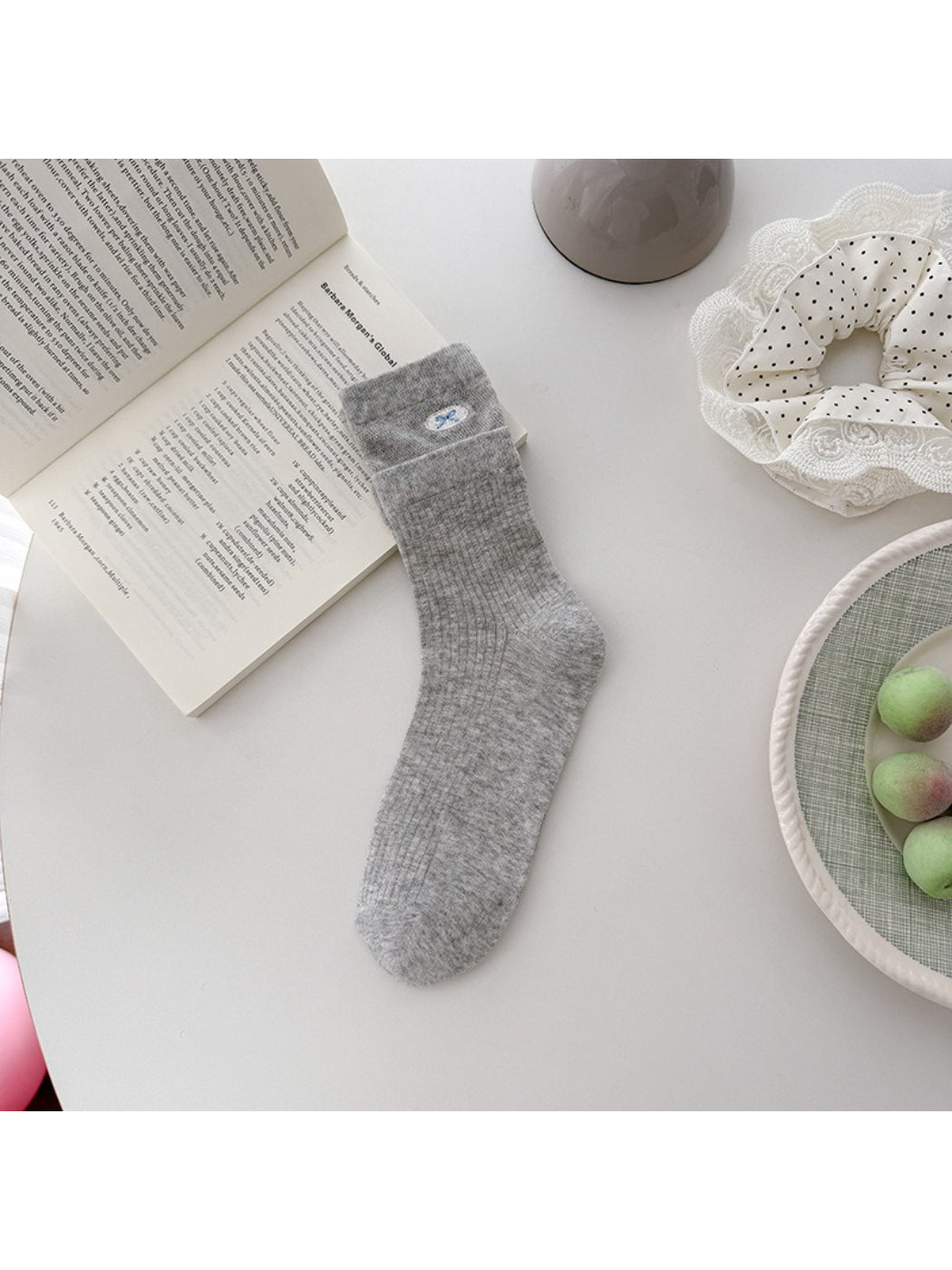 Rufia embroidered mesh mid-calf socks folded to highlight mesh texture and embroidery