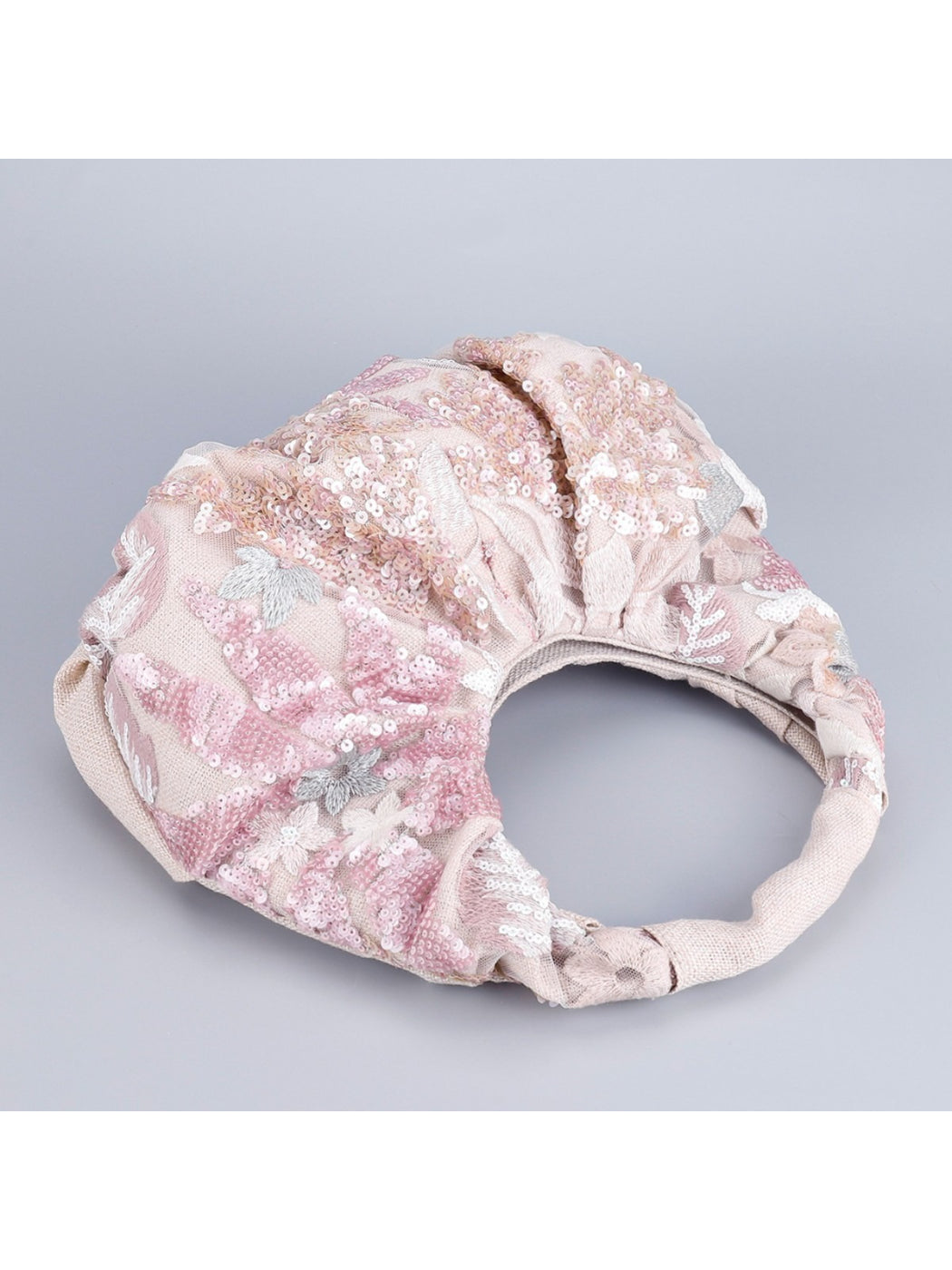Side view of Cosbai Floral Sequin Ruched Hobo Bag showing ruched texture