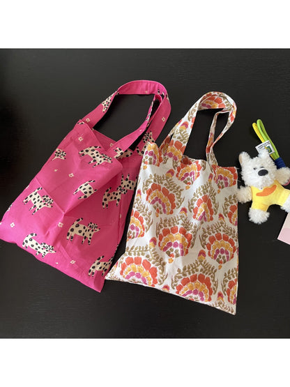 Cosbai printed everyday tote bag with colorful abstract design on white background