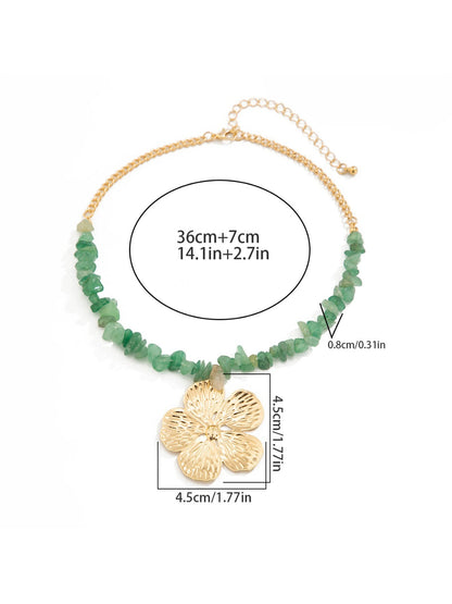 Model wearing Neckit Flower Pendant Beaded Necklace styled with casual outfit