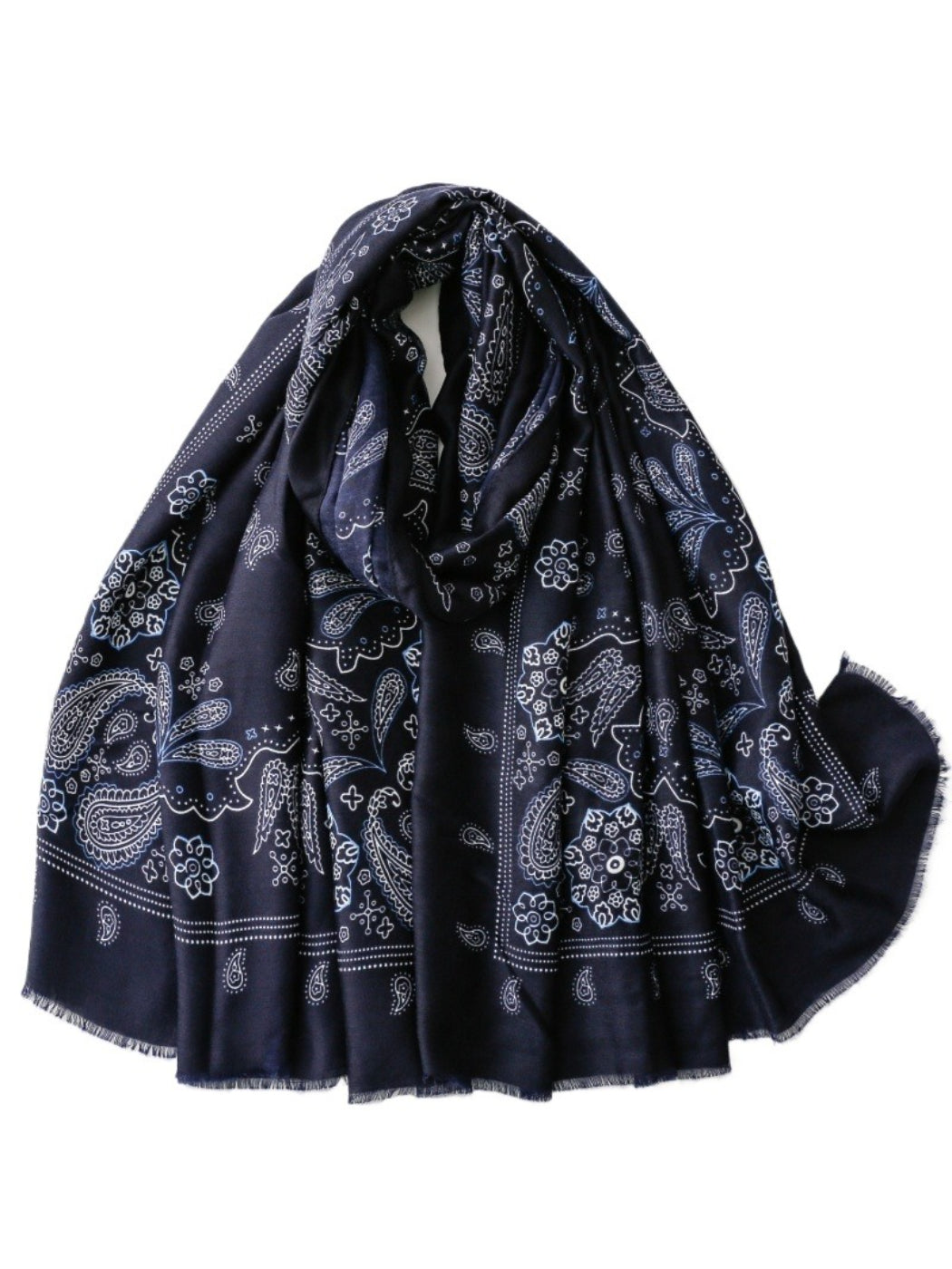 Scarf styled as a headwrap with visible paisley print and soft fabric