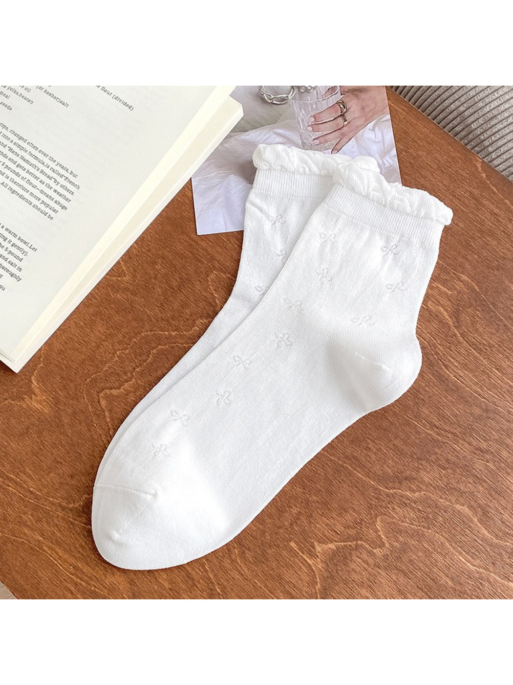 Model wearing Rufia Sweet Bow Knit Crew Socks with casual shoes
