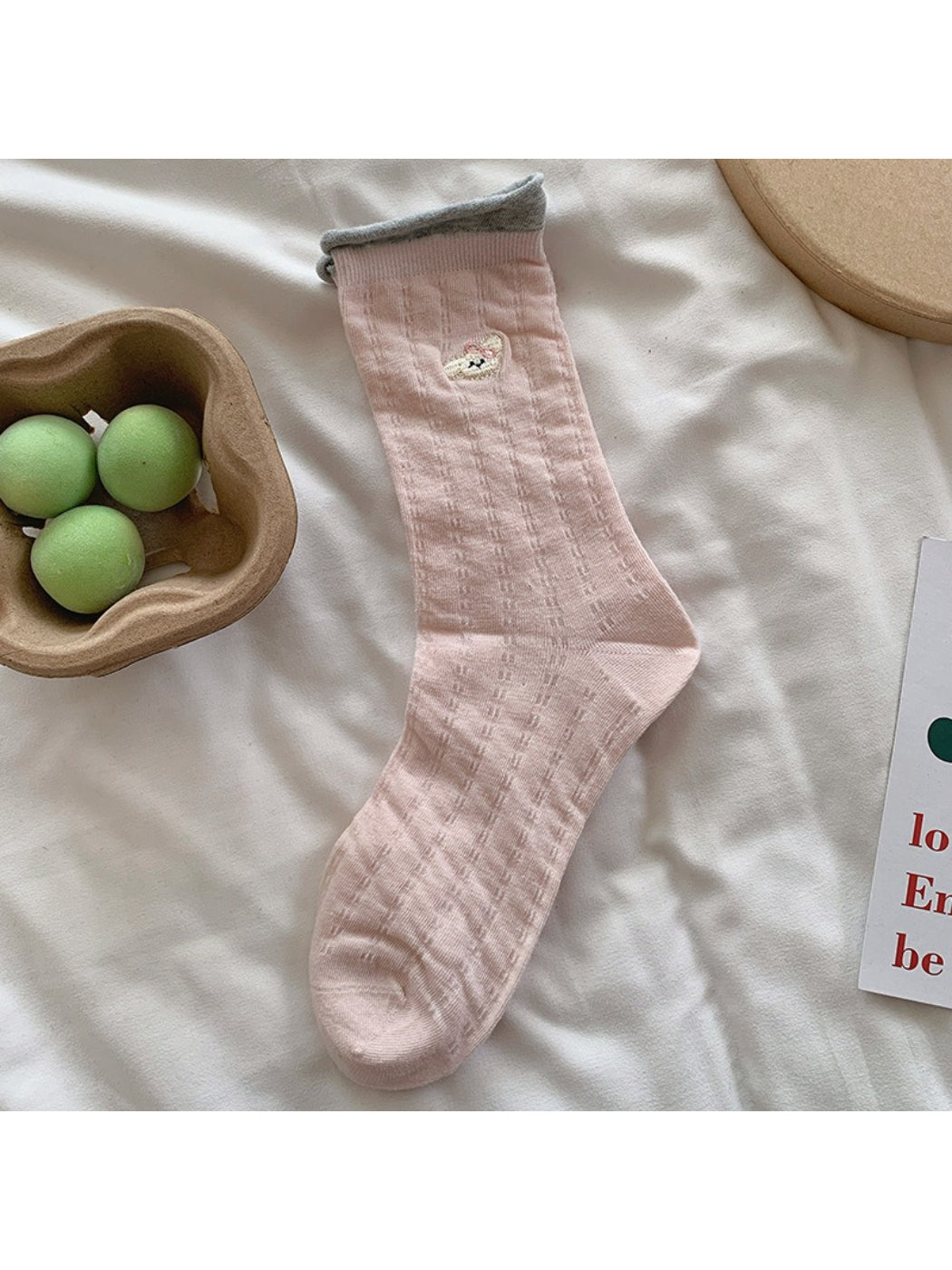 Rufia socks worn on feet showing the character design and comfortable fit
