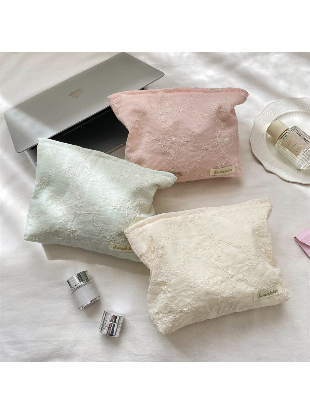 Cosbai floral embroidered cosmetic pouch with pink and green flower design on beige fabric