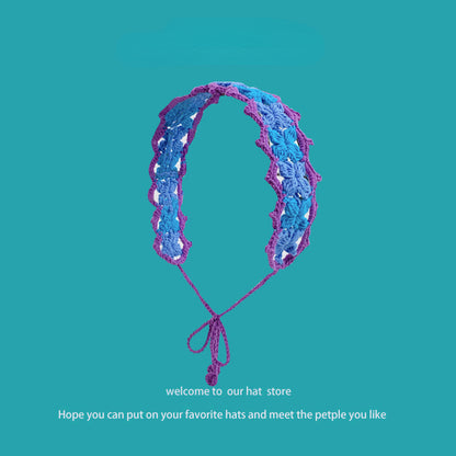 Crochet flower hairband displayed on white background showing full length