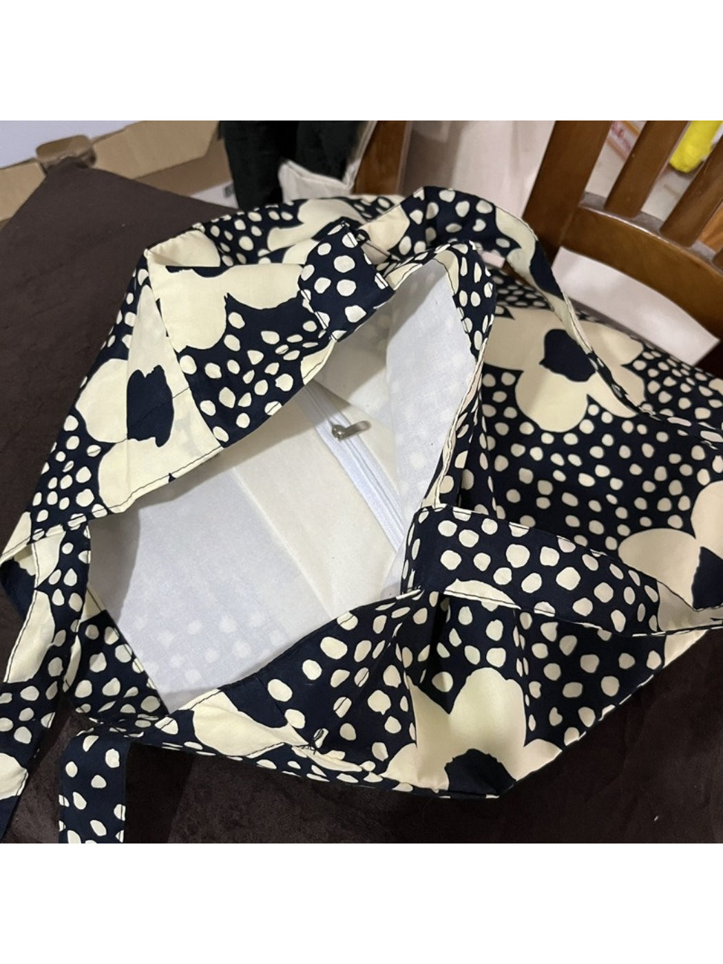 Side view of Cosbai Floral Dot Print Tote Bag highlighting shape