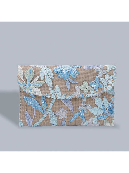 Cosbai elegant clutch bag photographed outdoors with background