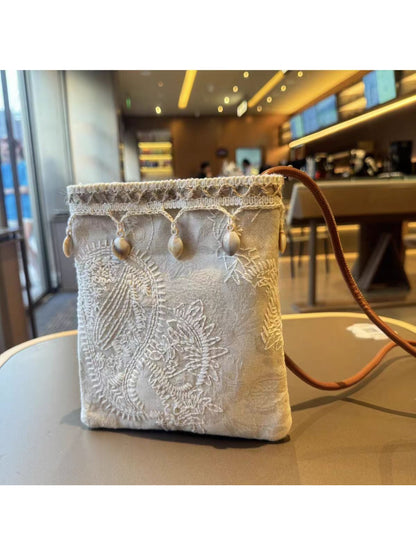 Close-up of Cosbai floral crossbody bag showing detailed textured flower design and zipper closure