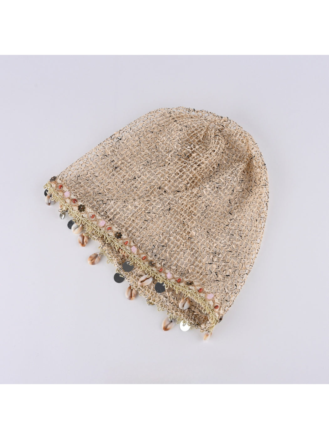 Side view of Haila hollow out knit mesh shell pattern beanie in beige