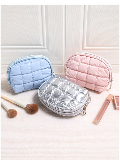 Cosbai Quilted Half Moon Cosmetic Case with zipper partially open