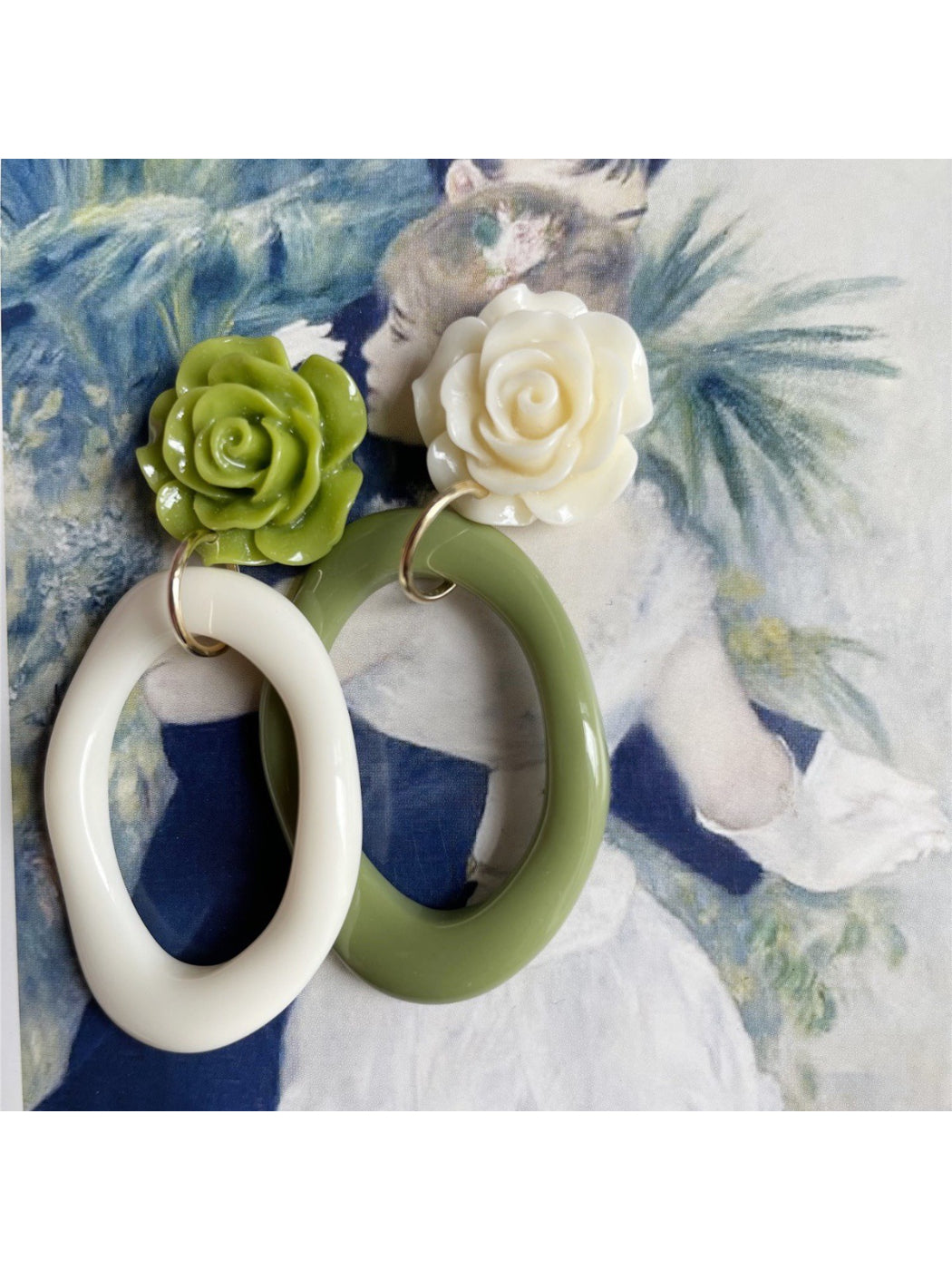 Side view of Earwish Rose Oval Hoop Earrings highlighting the hoop clasp mechanism