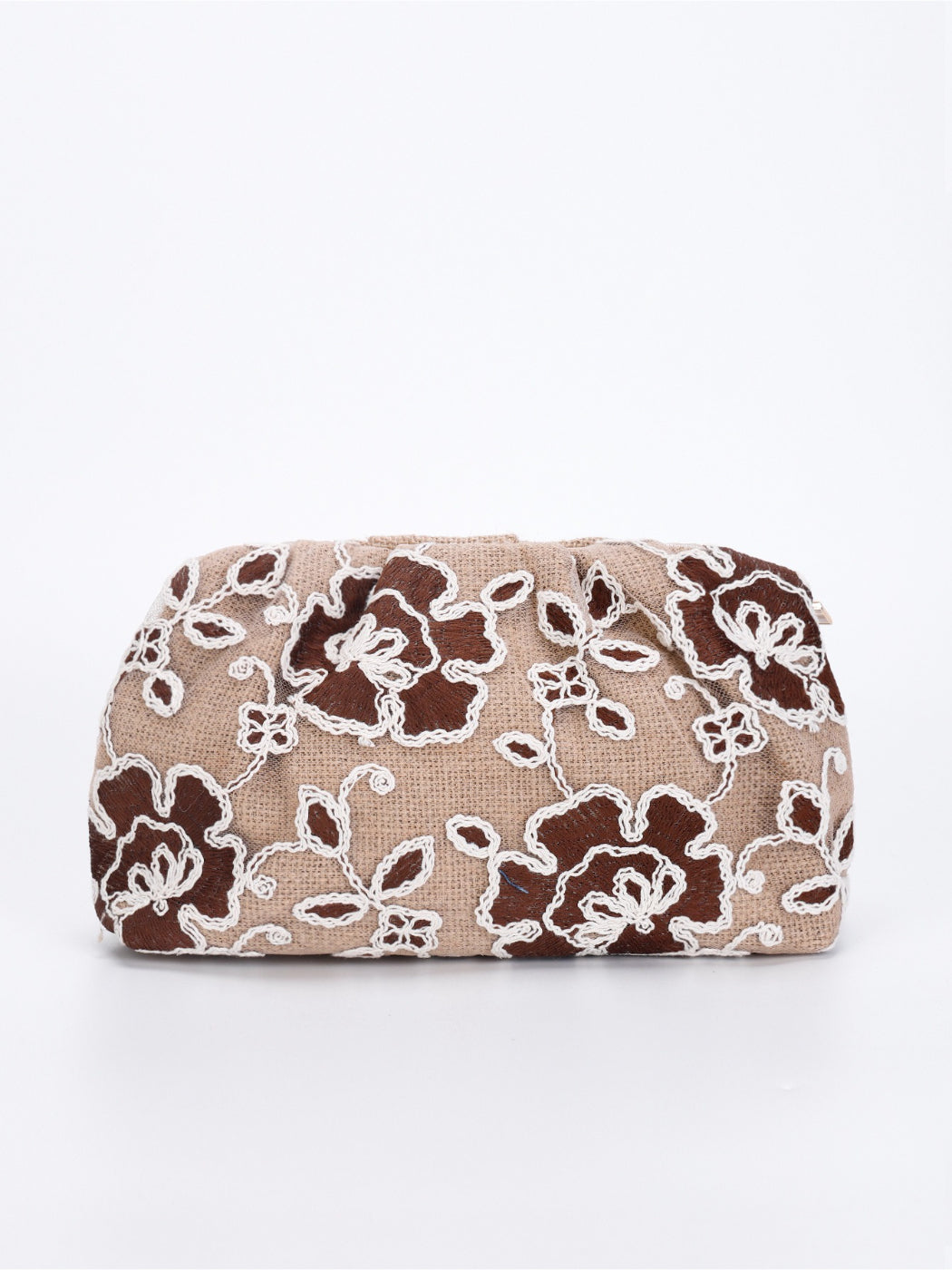 Cosbai clutch bag held in hand to show scale and intricate floral sequin design