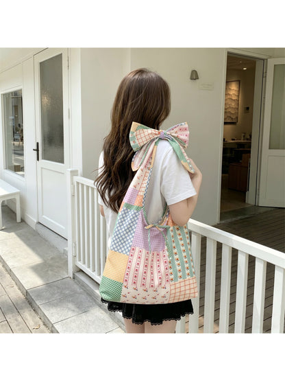 Side view of Cosbai Floral Patchwork Knot Strap Bag showing patchwork details and strap design