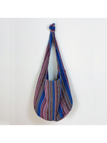 Top view of Cosbai striped slouchy crossbody bag showing opening