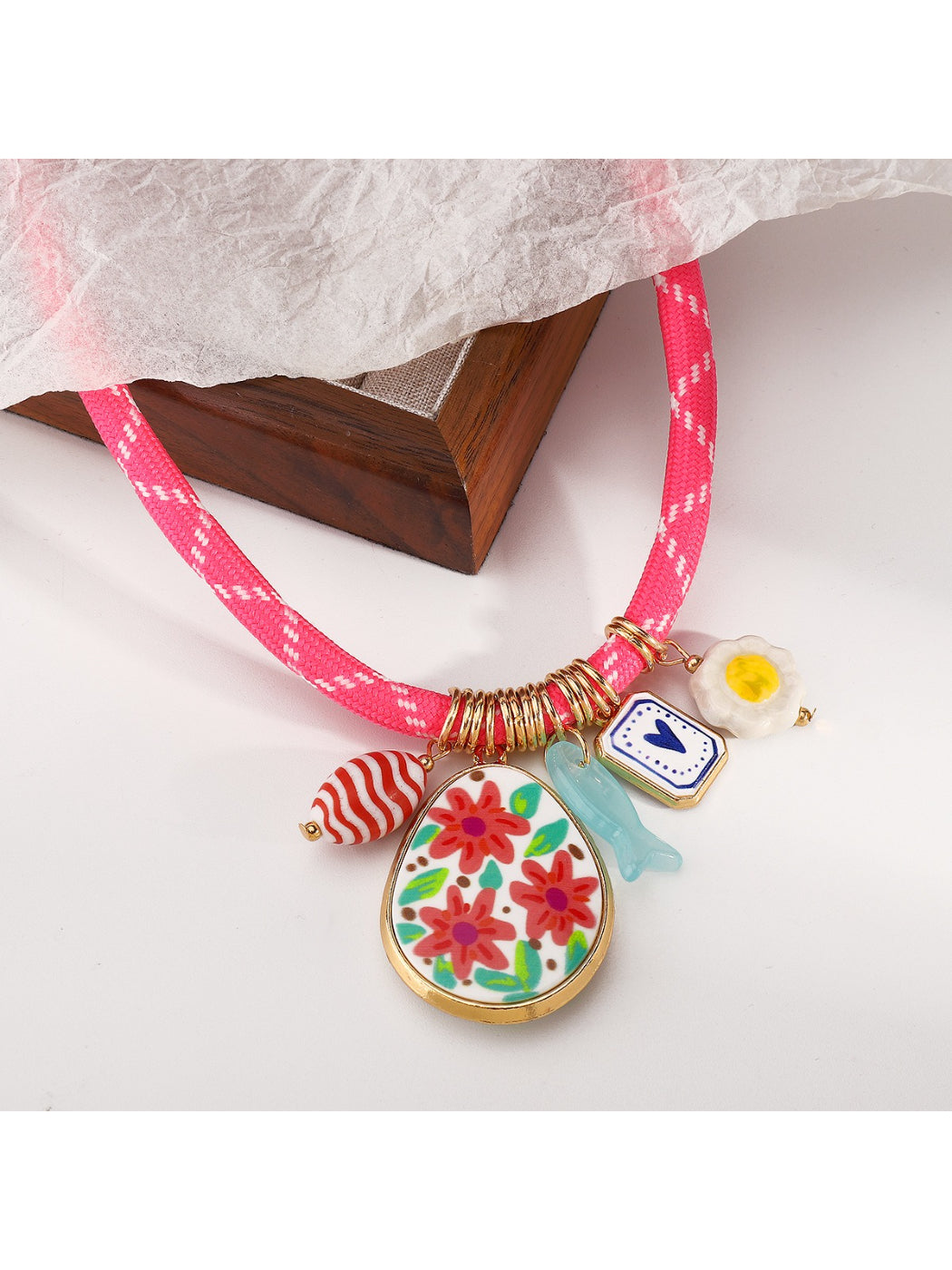 Close-up of clasp and charm details on Neckit Mixed Charm Beaded Necklace