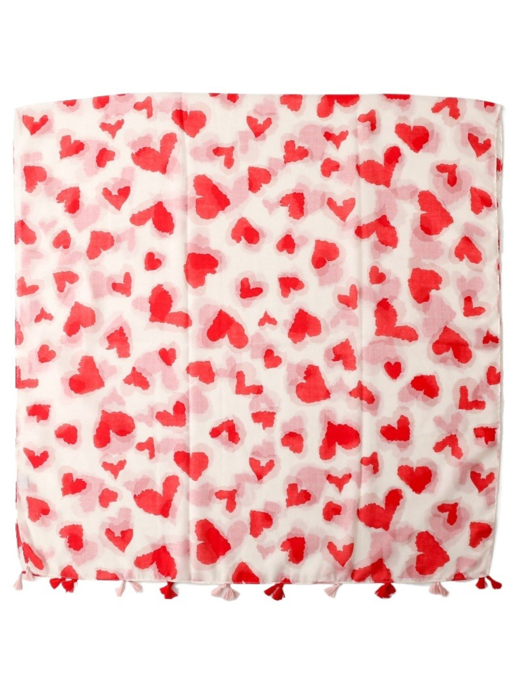 Scarvii scarf laid flat displaying full heart print design and tassels