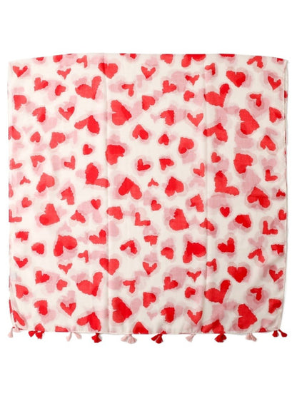 Scarvii scarf laid flat displaying full heart print design and tassels