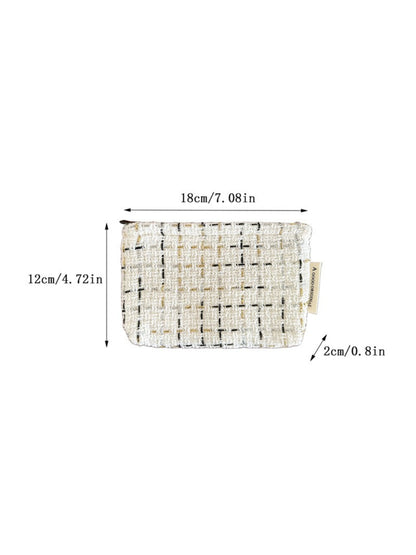 Side view of Cosbai tweed makeup organizer pouch highlighting its slim profile