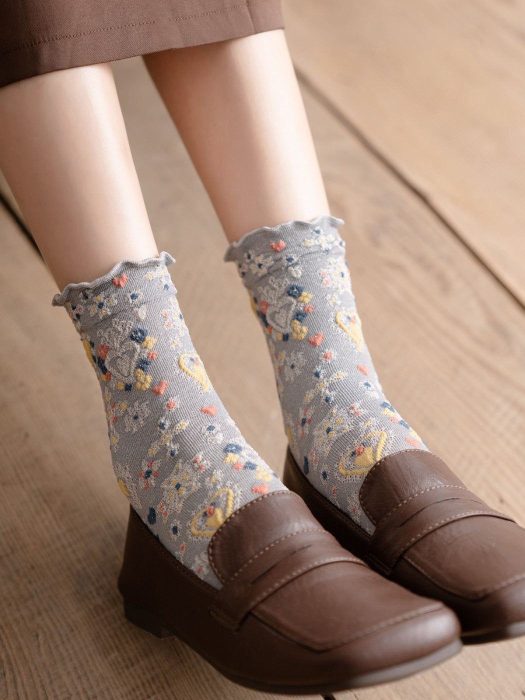 Rufia Heart White Mid-Calf Socks worn with casual shoes showing heart pattern on sides